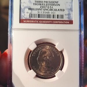 Thomas Jefferson Commemorative 1$ Coin. Brilliant Uncirculated Grade By NGC.